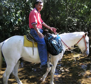 Humberto riding
                    to church in Jahuaca