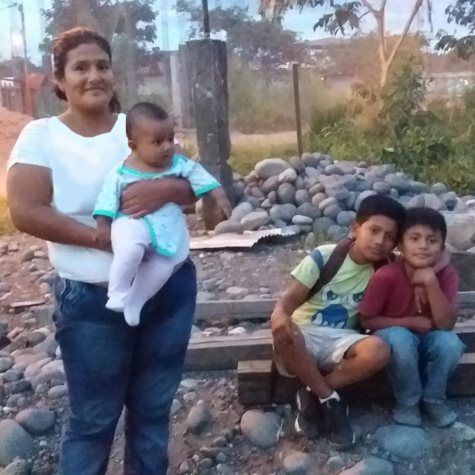 Marco Patricio Quispe and wife, Blanca Azucena
                  Peralta with their three sons in Puyo, Ecuador